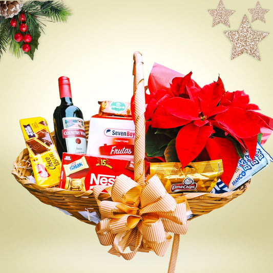 Cesta de natal c/ vinho, flores, panettone, chocolates e biscoitos.